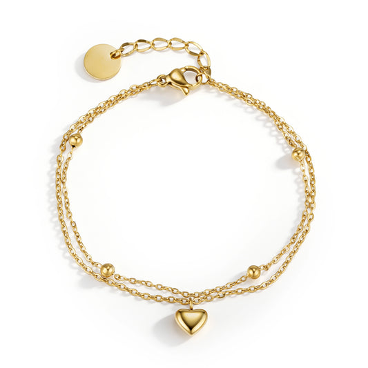 Gold bracelet featuring fine layered chains, small bead details and a heart charm, shown on a white background.