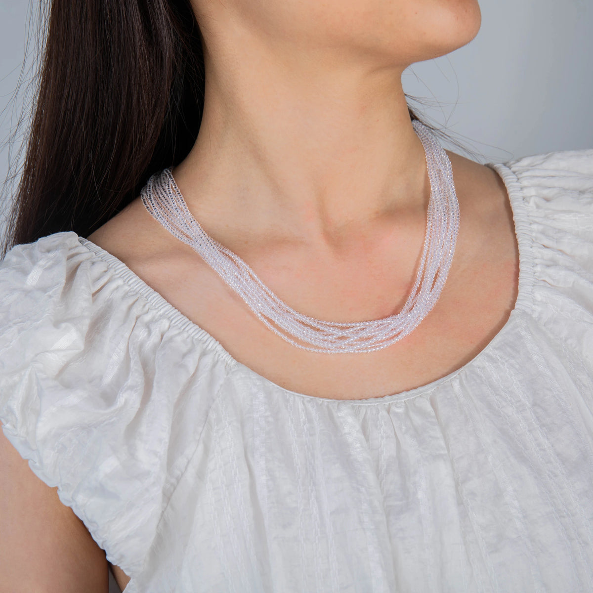 AJN-195 wholesale multi-strand crystal necklace on white background