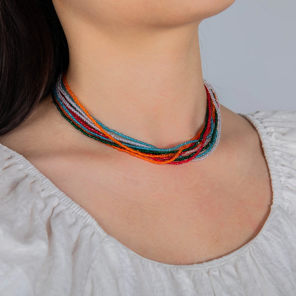AJN-201 wholesale multi-strand crystal necklace on white background