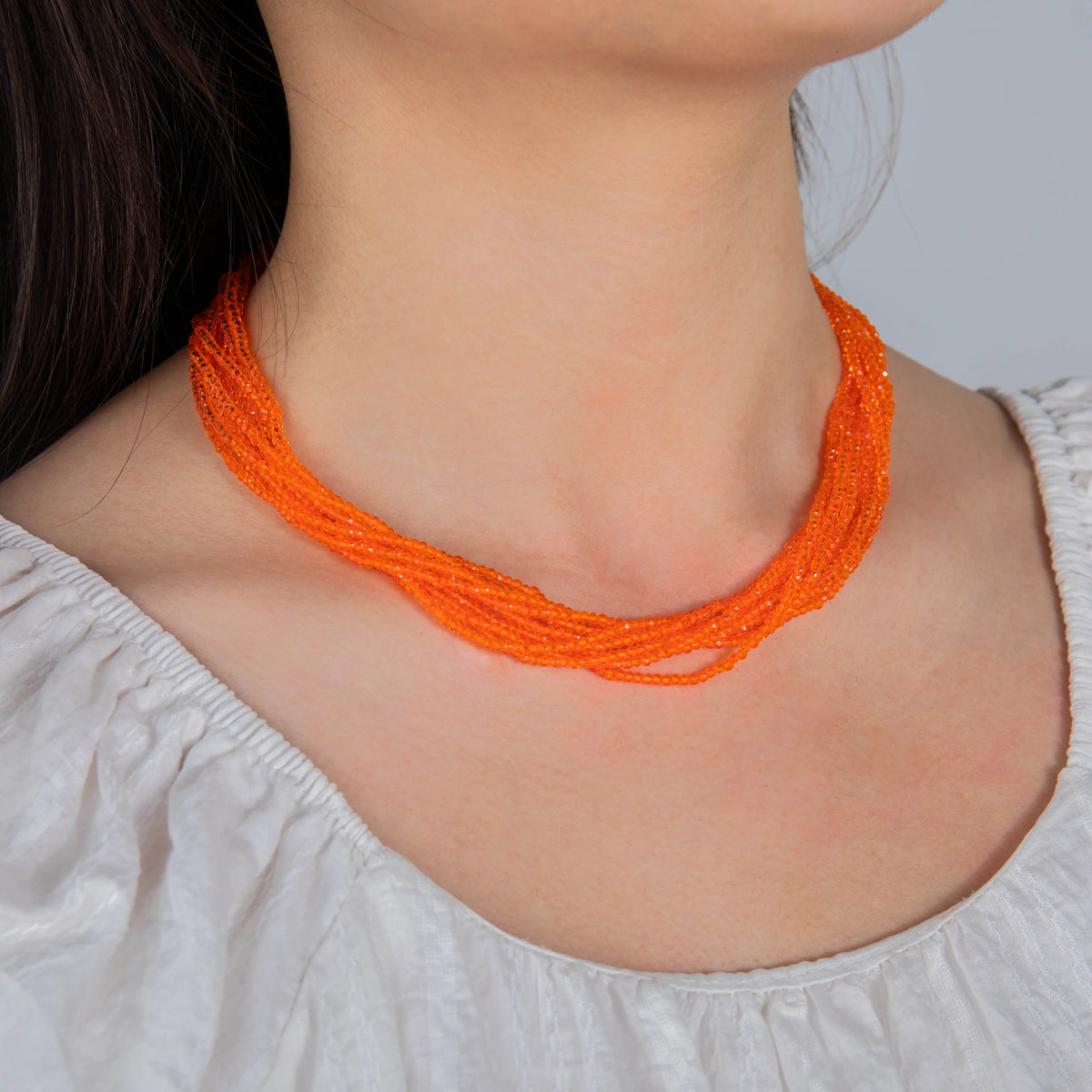 AJN-203 wholesale multi-strand crystal necklace on white background