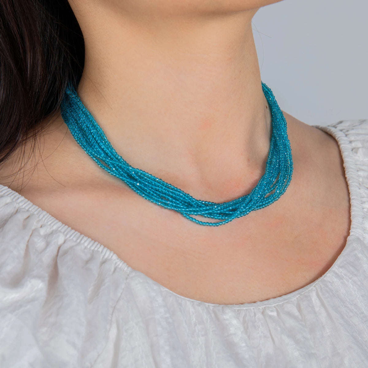 AJN-232 wholesale multi-strand crystal necklace on white background