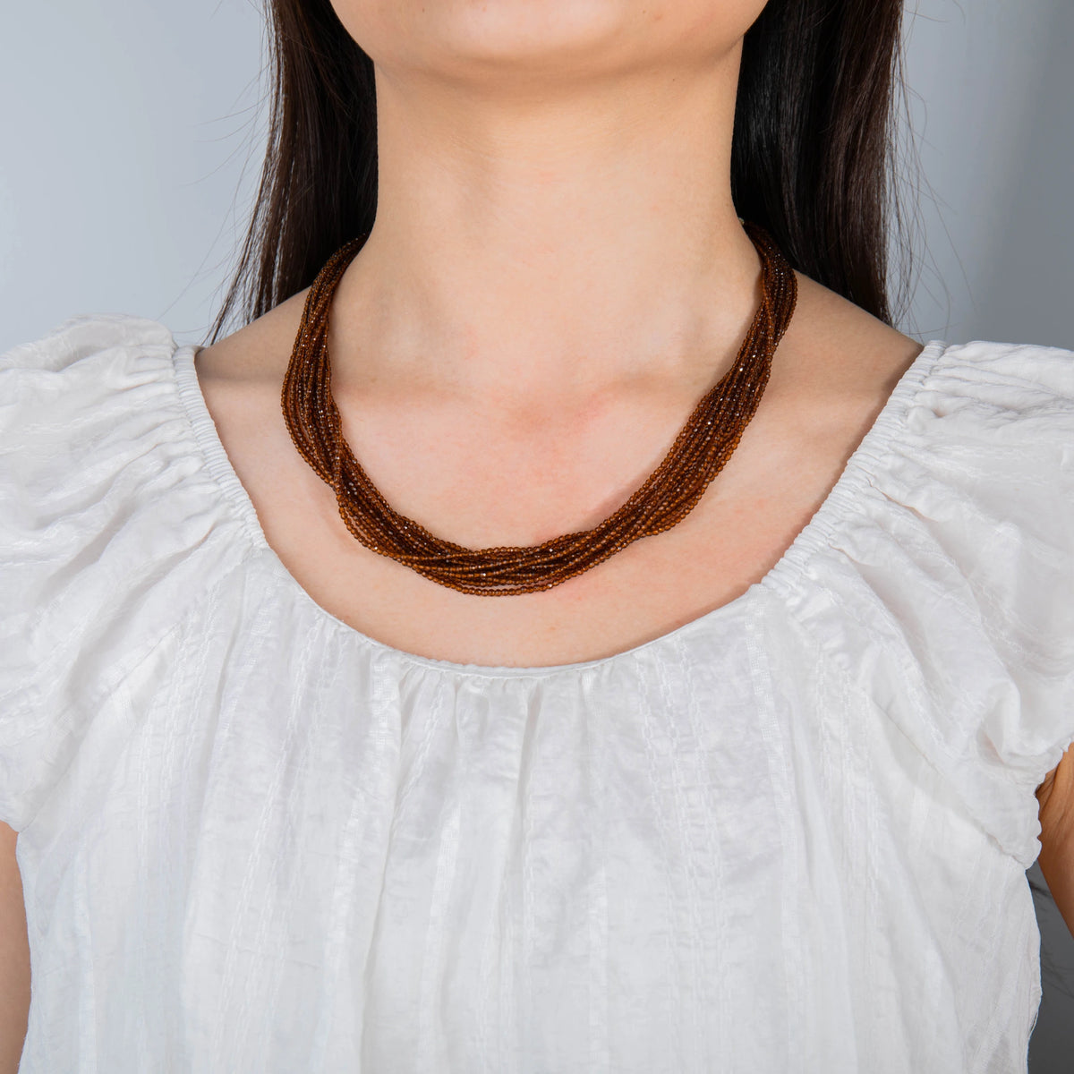 AJN-239 wholesale multi-strand crystal necklace on white background
