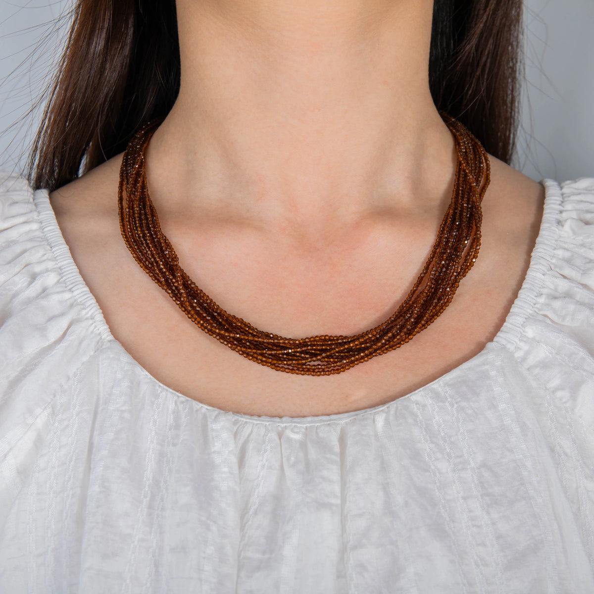 AJN-239 wholesale multi-strand crystal necklace on white background