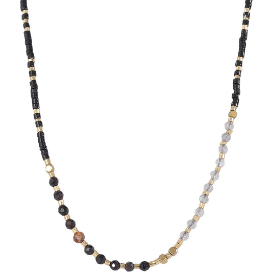 This delicate pink tourmaline and seed‑bead necklace delivers soft romantic‑feminine charm.