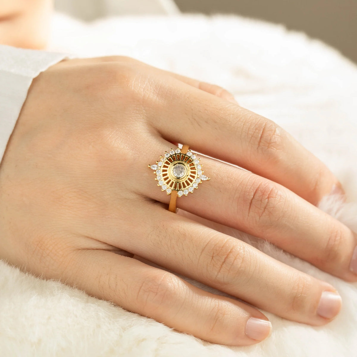 Gold-plated brass open ring shown on hand