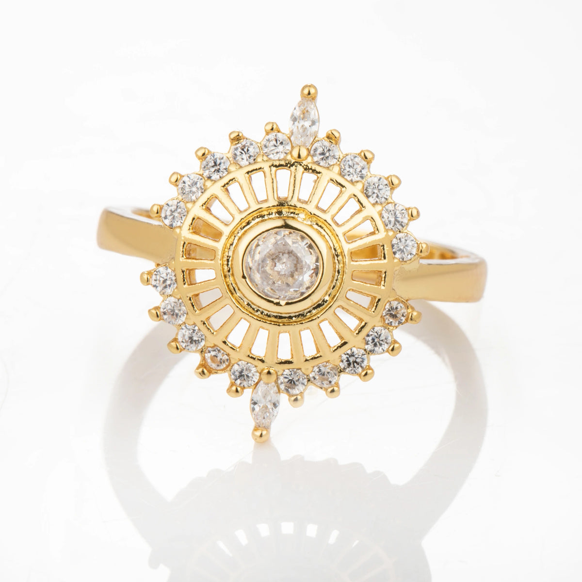 Sunburst gold-plated brass open ring on white background