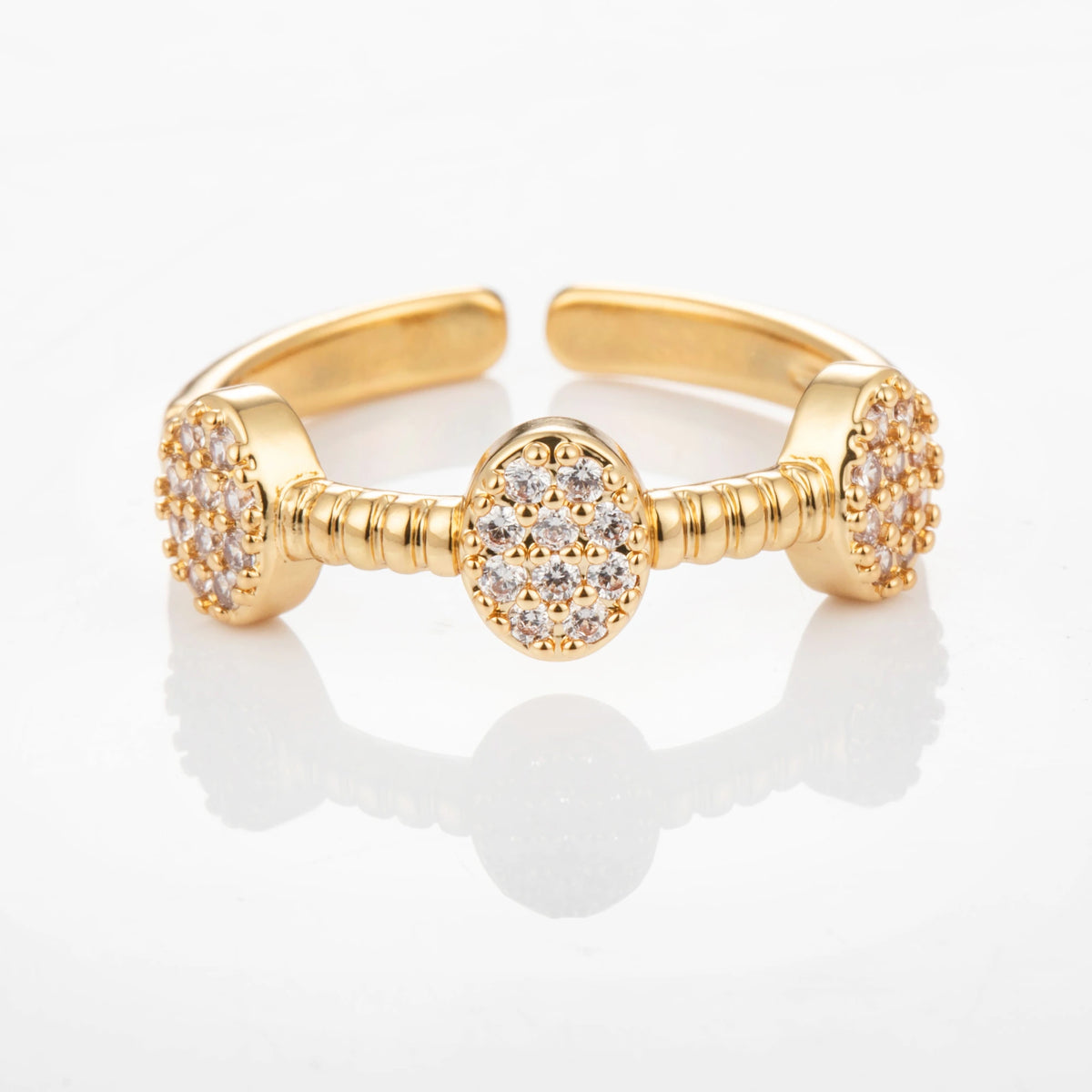 Triple Medallion gold-plated brass open ring on white background