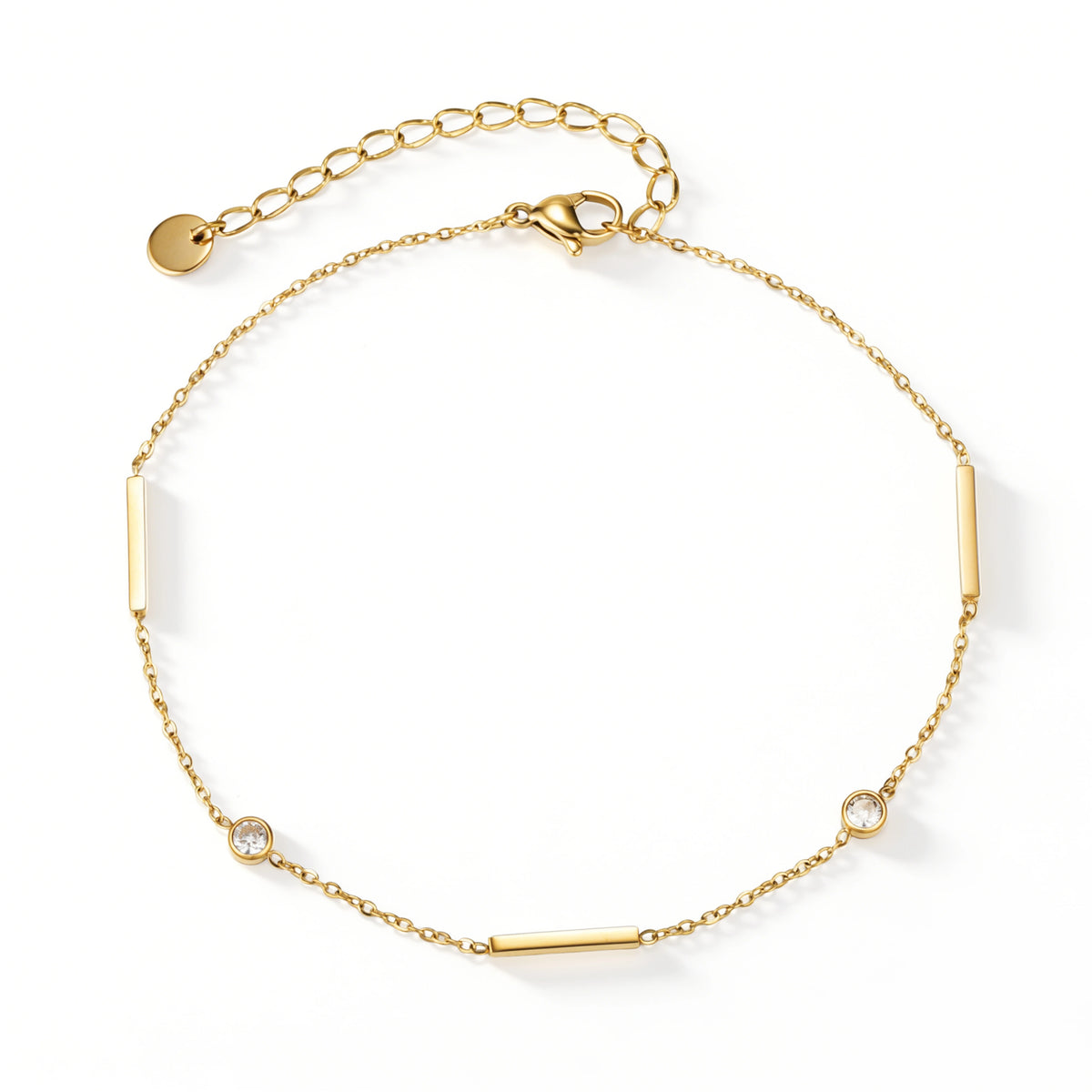 Gold bracelet featuring slender bar stations alternating with clear round accents, shown on a white background.