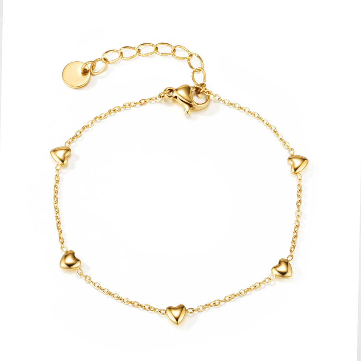 Gold bracelet featuring small polished heart motifs spaced around a fine chain, shown on a white background.