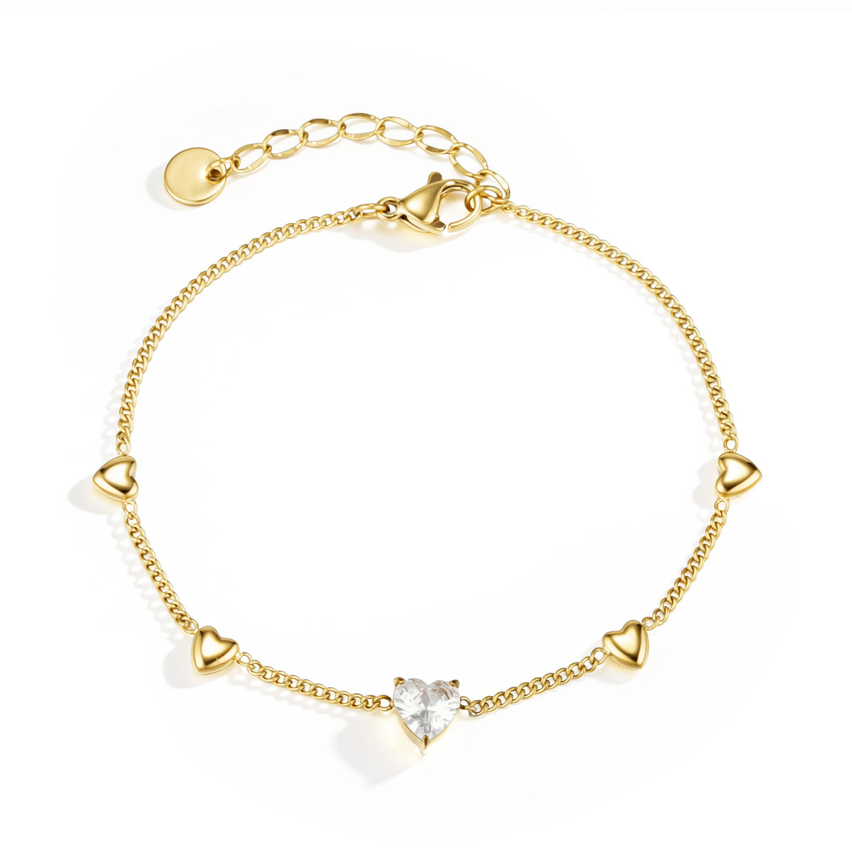 Gold bracelet featuring polished gold-tone hearts and a larger clear heart accent, shown on a white background.