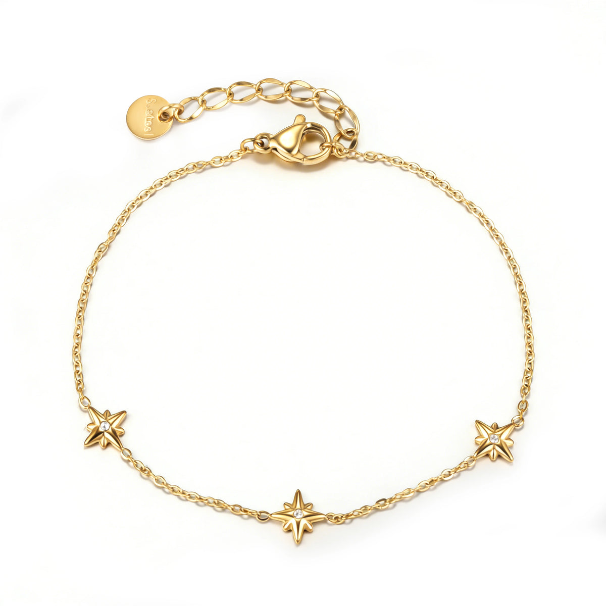 Gold bracelet featuring three sculpted star motifs spaced along a fine chain, shown on a white background.